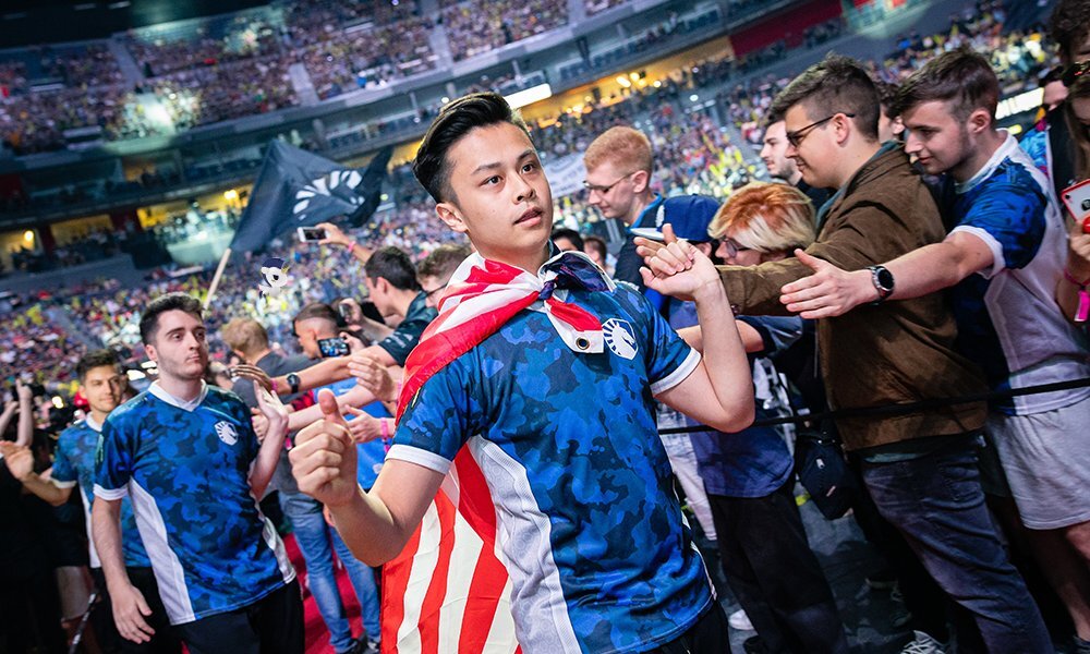 Stewie2k and NAF moving through at the Boston Major surrounded by fans.