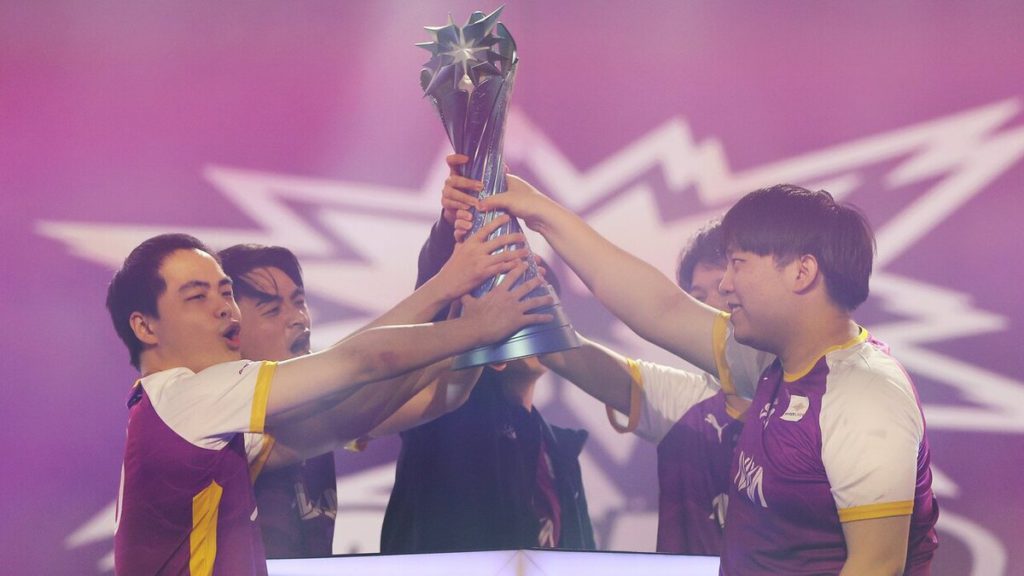 Nova Esports posing with their Wild Rift Icons trophy