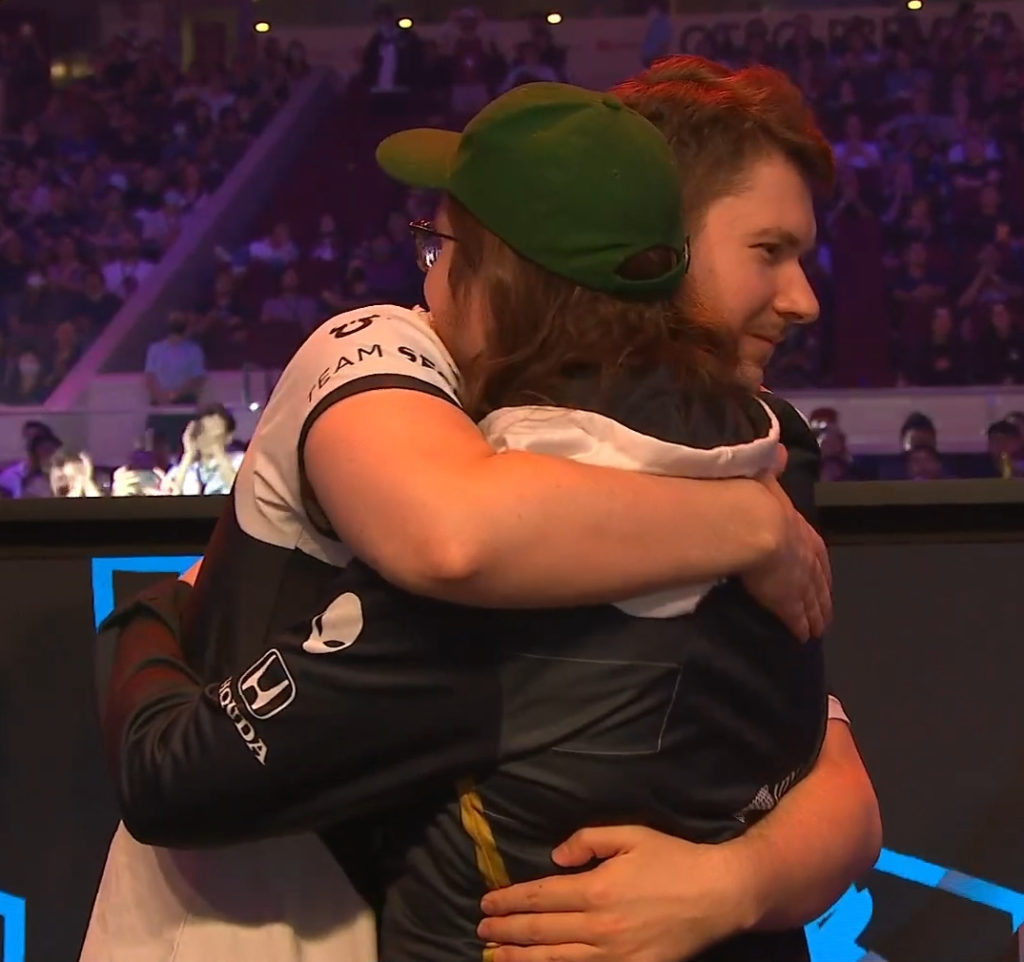 Liquid's Matu and Secret's Puppey hugging it out after their TI11 match 